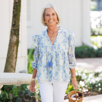 Falling Violets Ruffle Front Top with Tassels