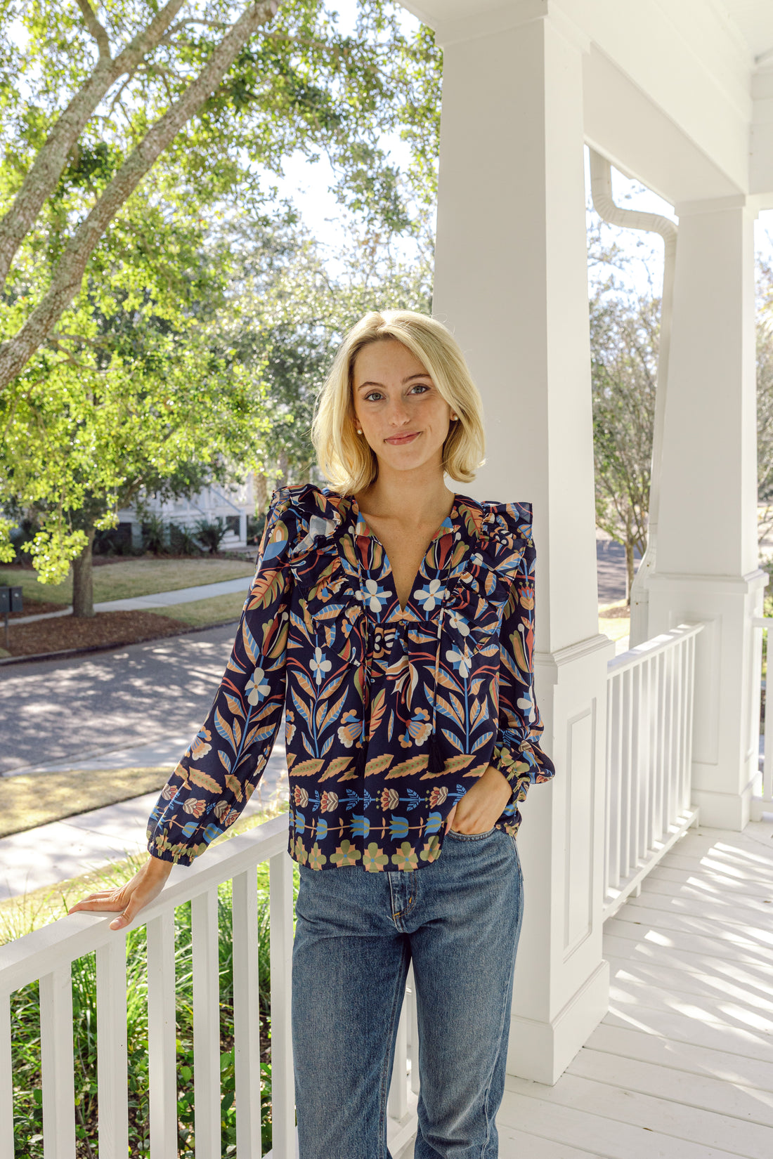 Navy Geo Floral Ruffle Front Top with Tassels