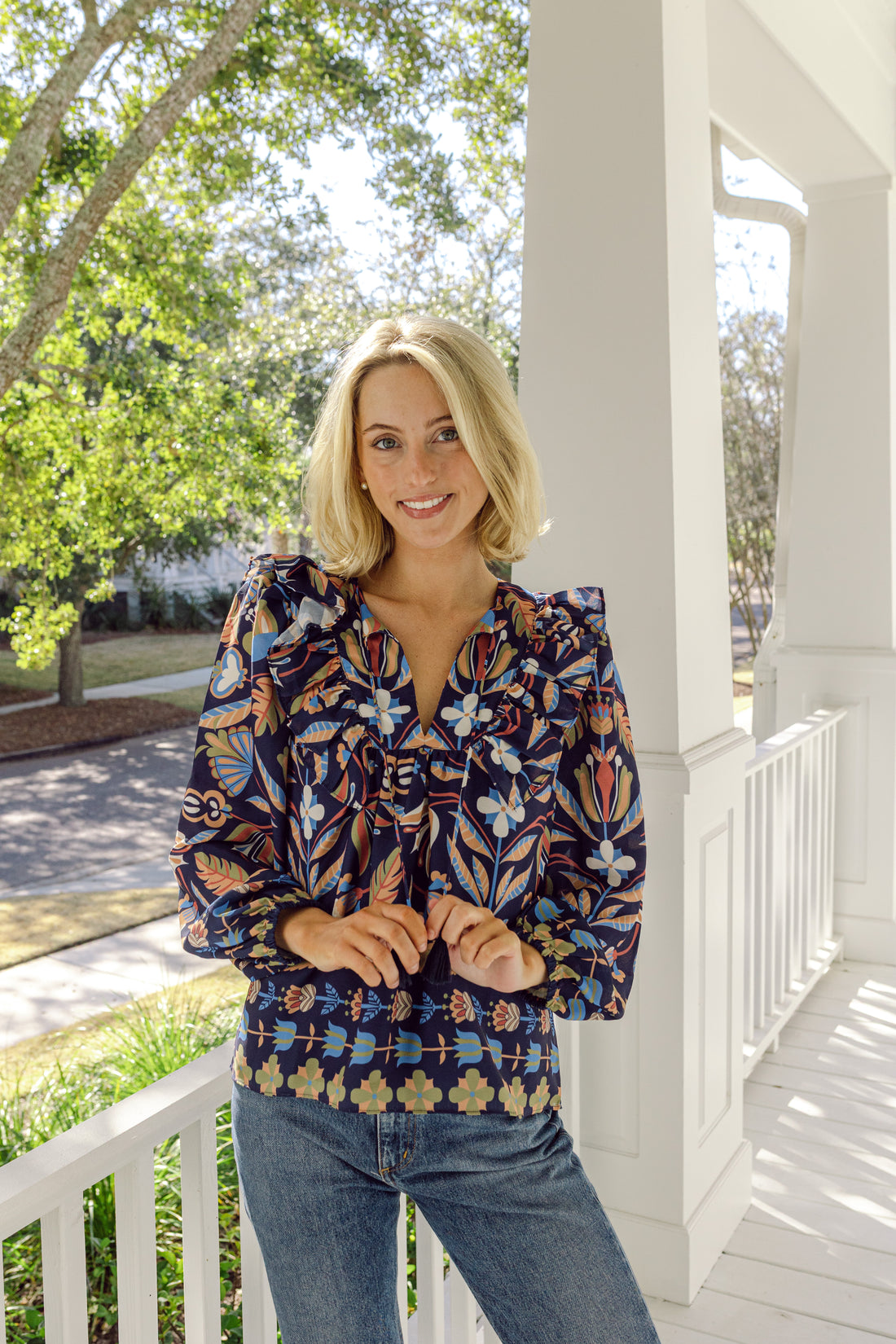 Navy Geo Floral Ruffle Front Top with Tassels